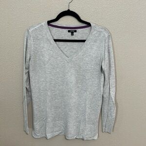Women’s gray sweater in a small.